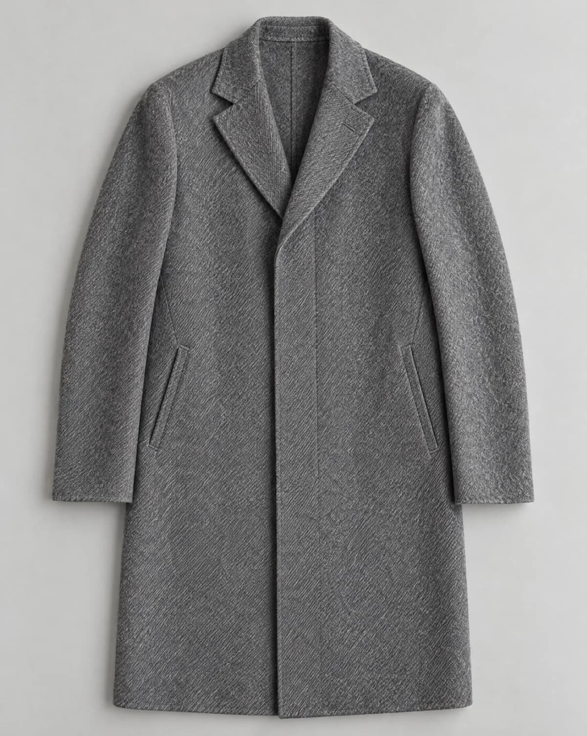 The flat-lay of the double-faced overcoat, the input of this look