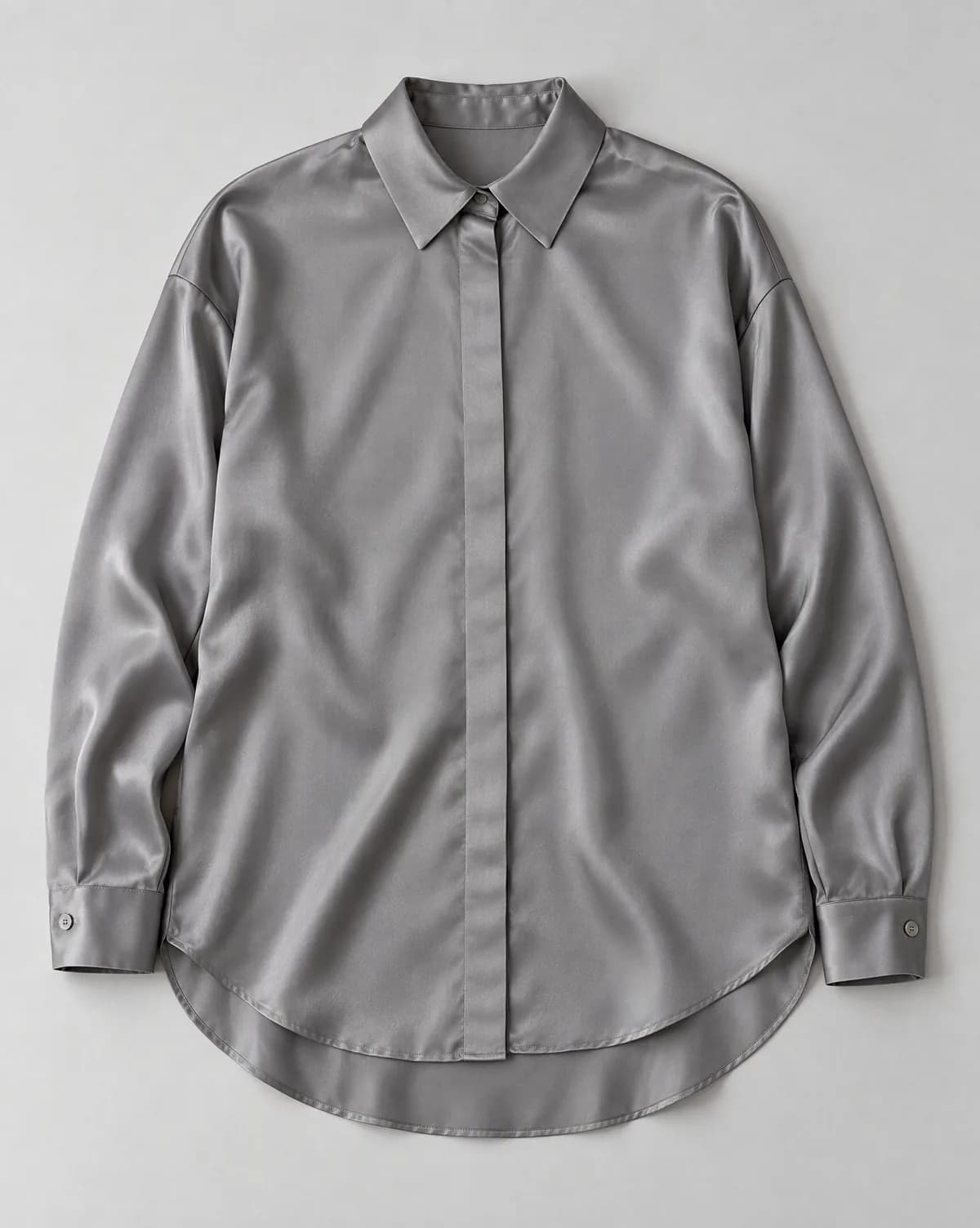 The flat-lay of the silk shirt, the input of this look