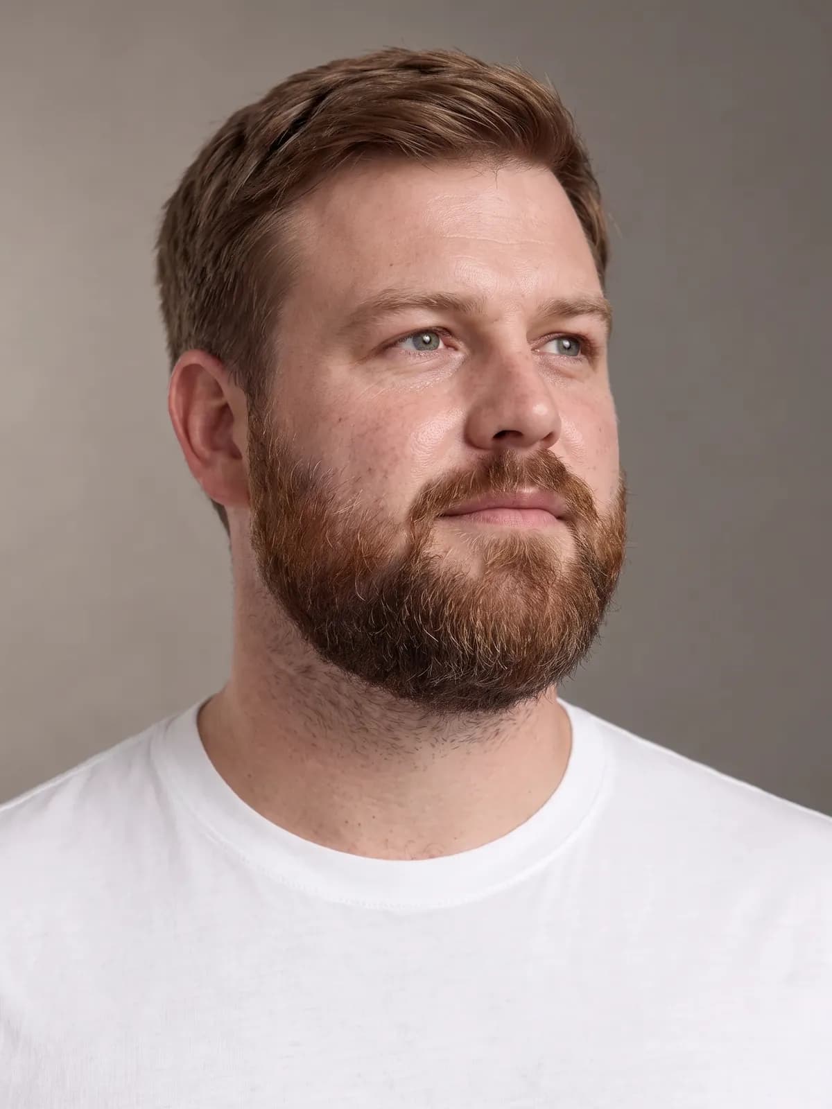 Portrait of Jake, looking past the camera, in soft side light