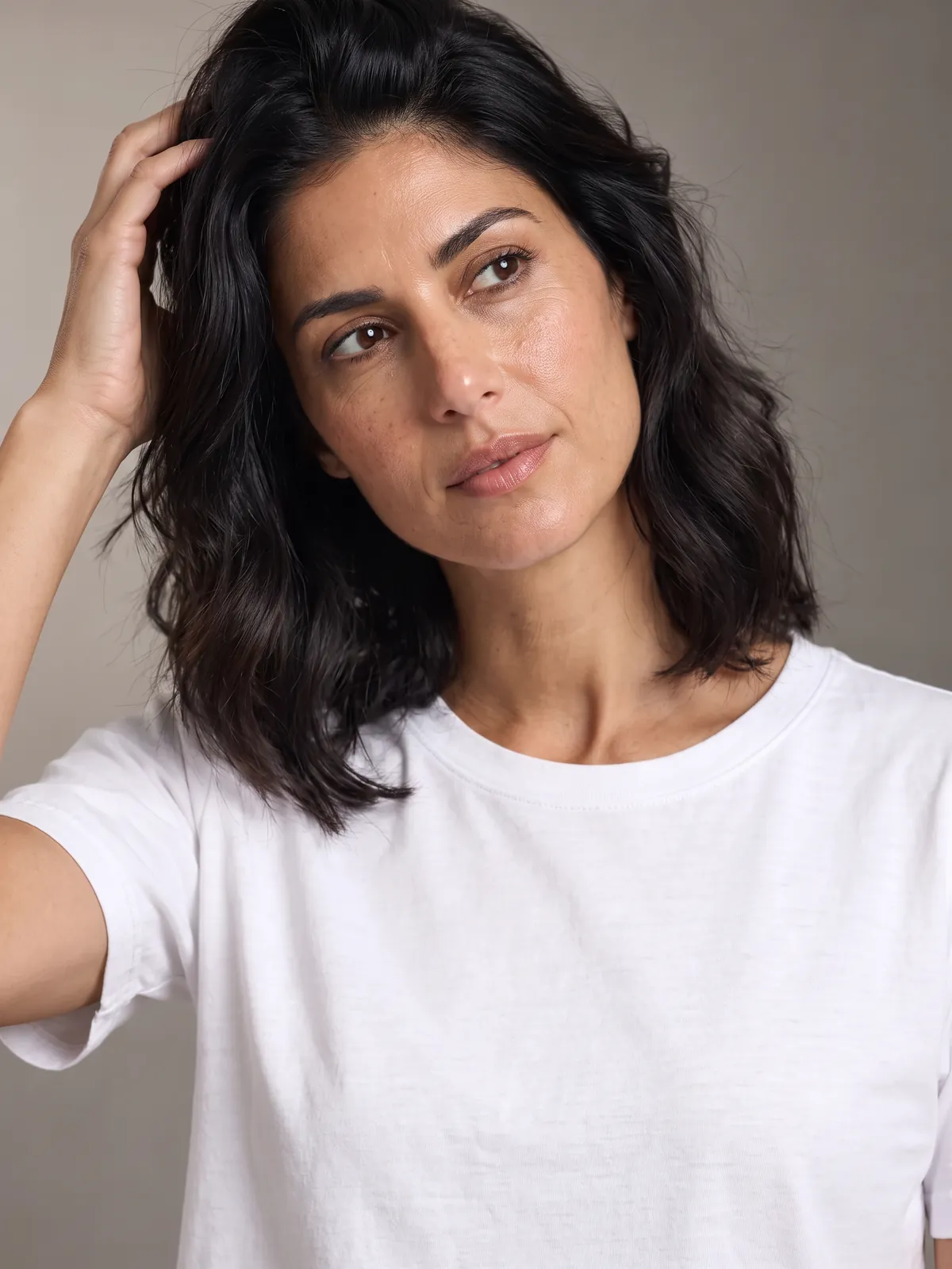 Portrait of Marta, looking past the camera, in soft side light